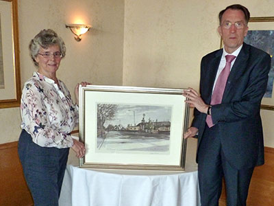 James Thewliss being presented with a painting